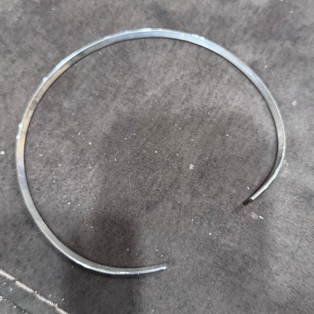 Staple piece alert! ✨ Selling this classic, silver-tone open torque